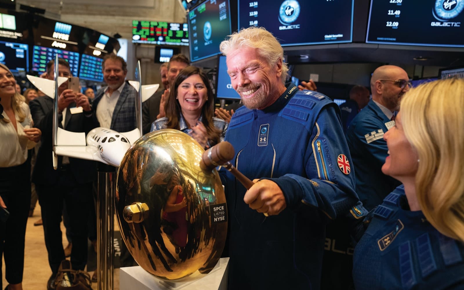 Richard Branson rings the bell at the New York Stock Exchange as Virgin Galactic is listed