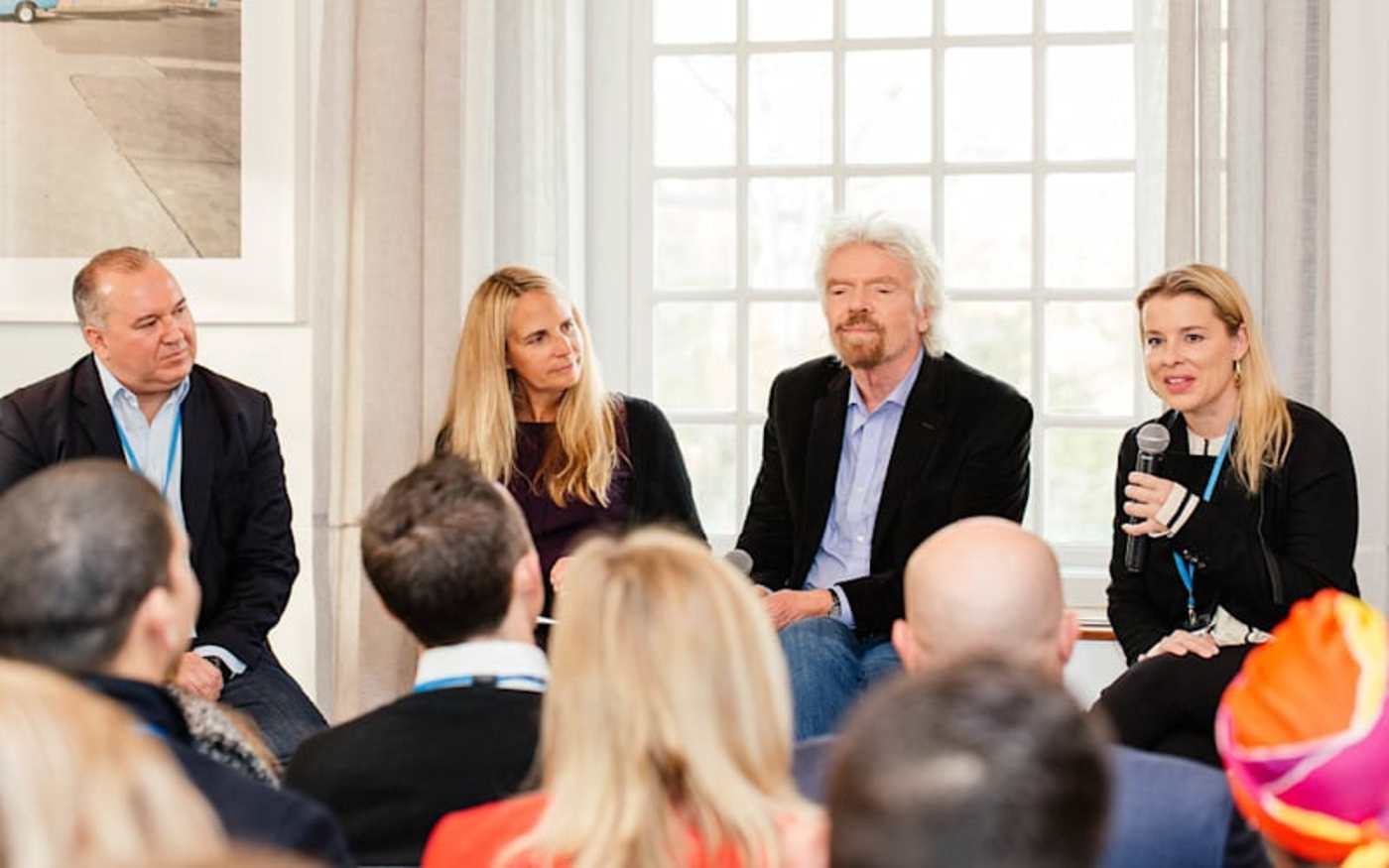 Jean Oelwang and Richard Branson speak on a panel discussion