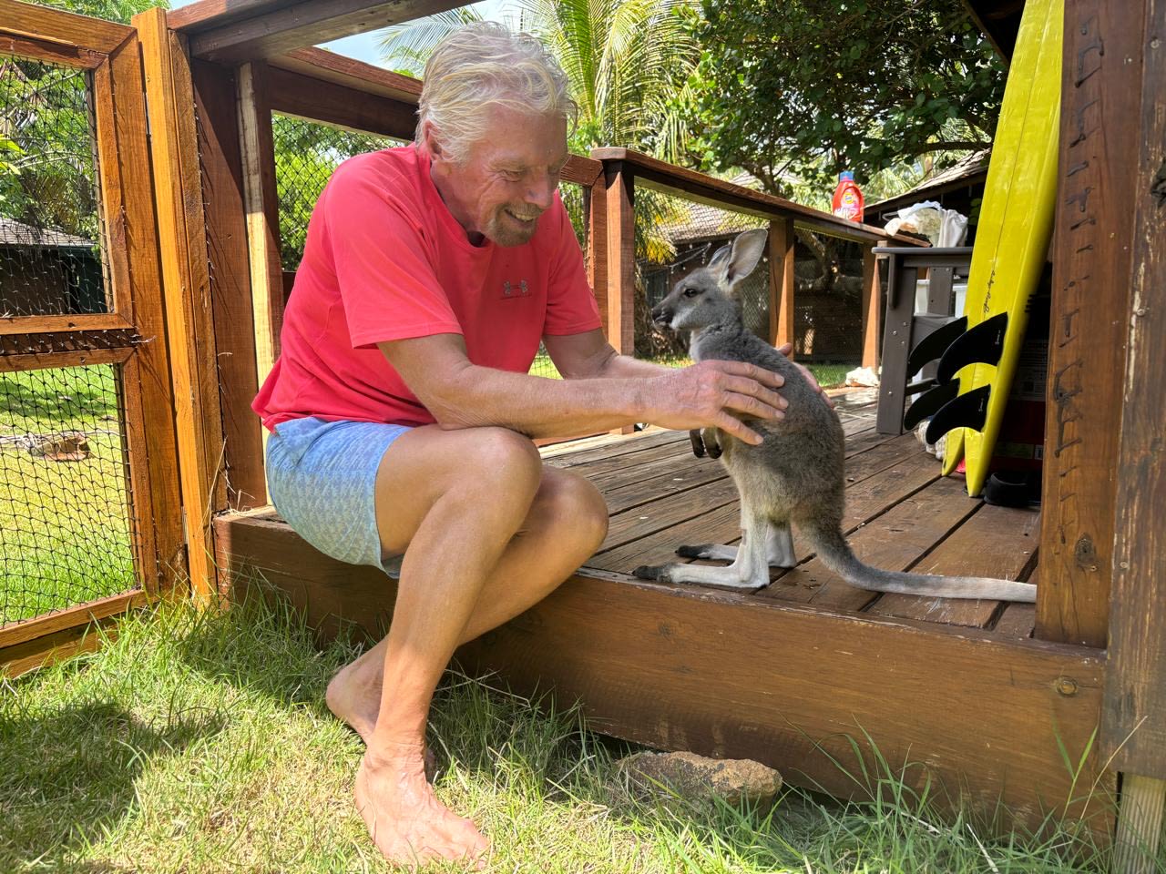 Richard Branson on Necker Island with a baby kangaroo