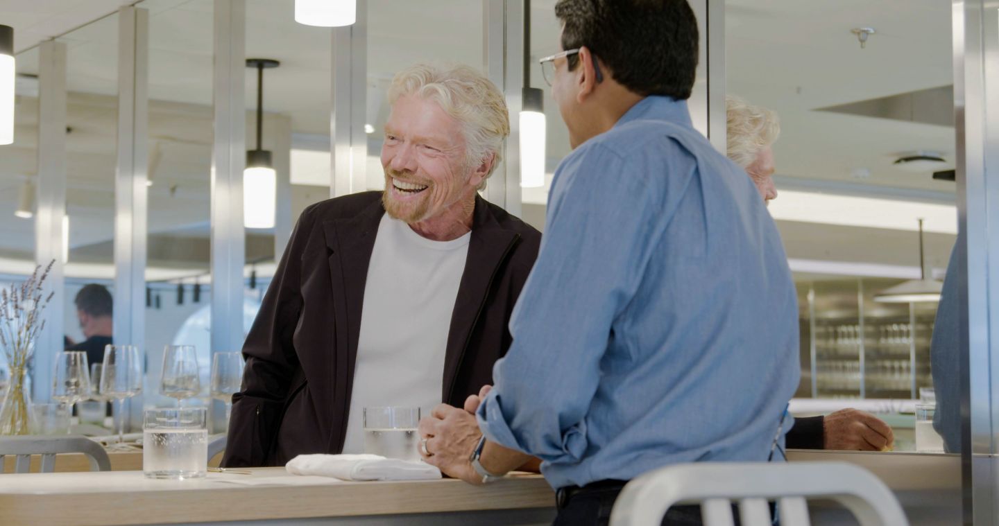 Richard Branson trying out Upside Food's chicken 