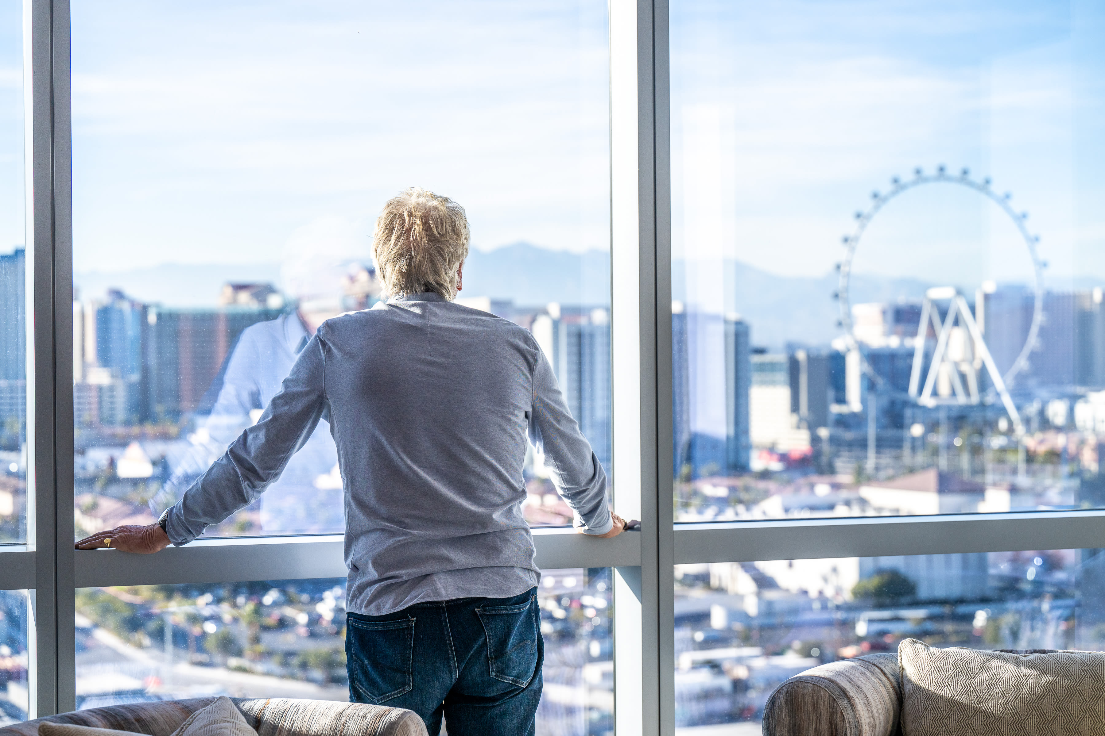 Richard Branson at Virgin Hotels Las Vegas, looking at the view