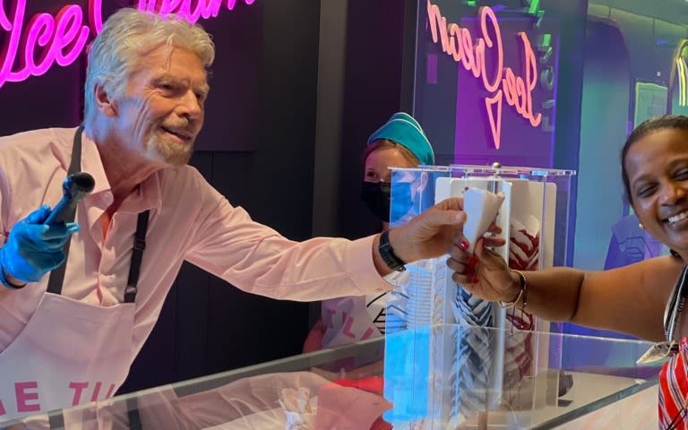 Richard Branson serving ice cream