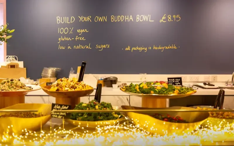 Bowls of salad behind the counter of Redemption Bar in London