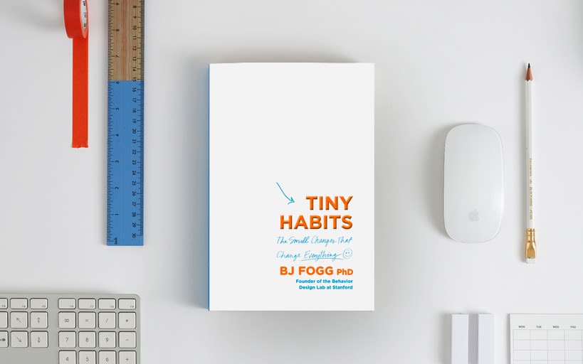 A copy of Tiny Habits surrounded by stationery