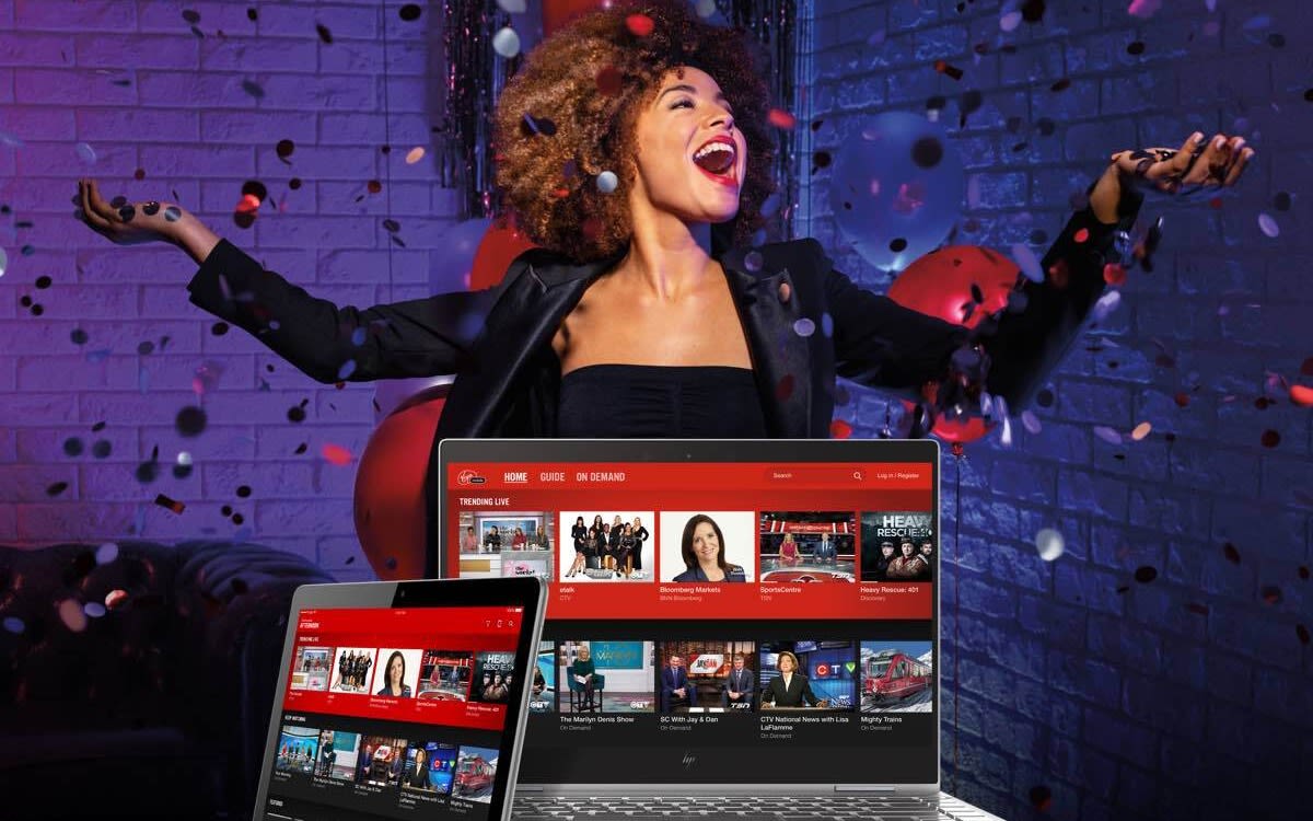 A woman celebrates the launch of Virgin TV