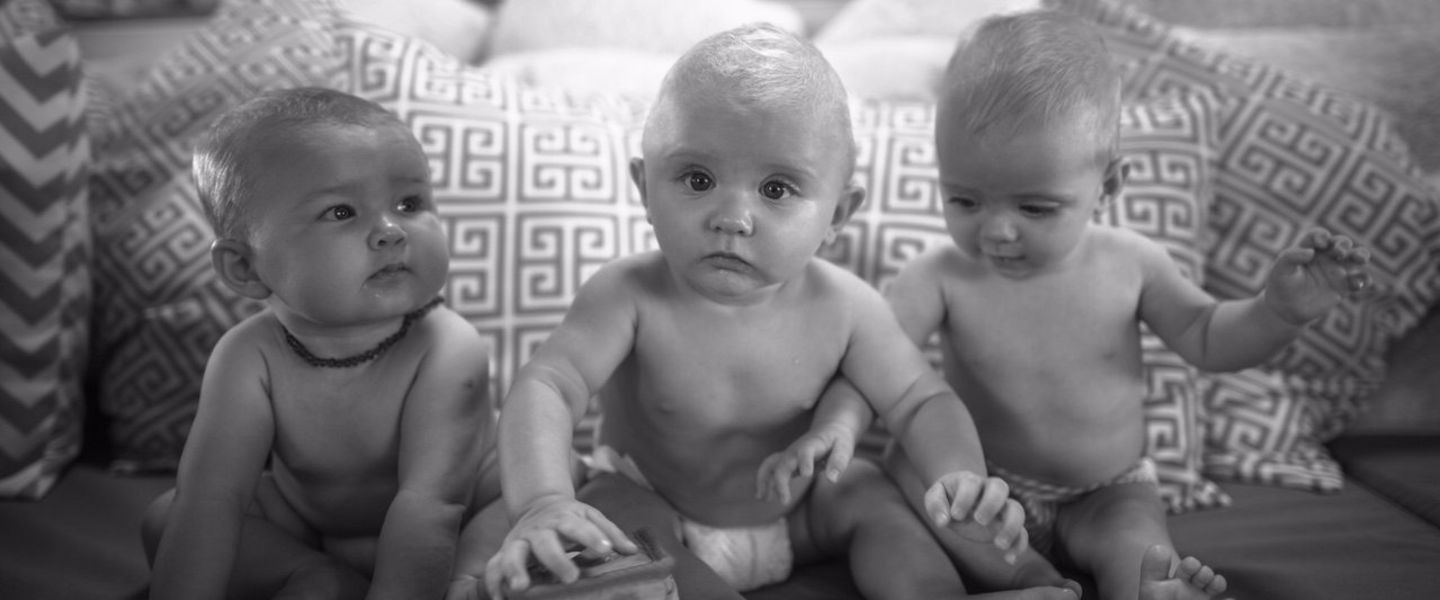 Three sitting babies