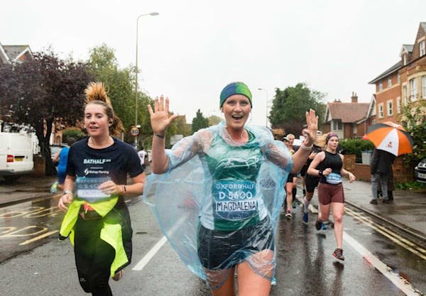 Happy runners on a street in Oxford, doing the half marathon.