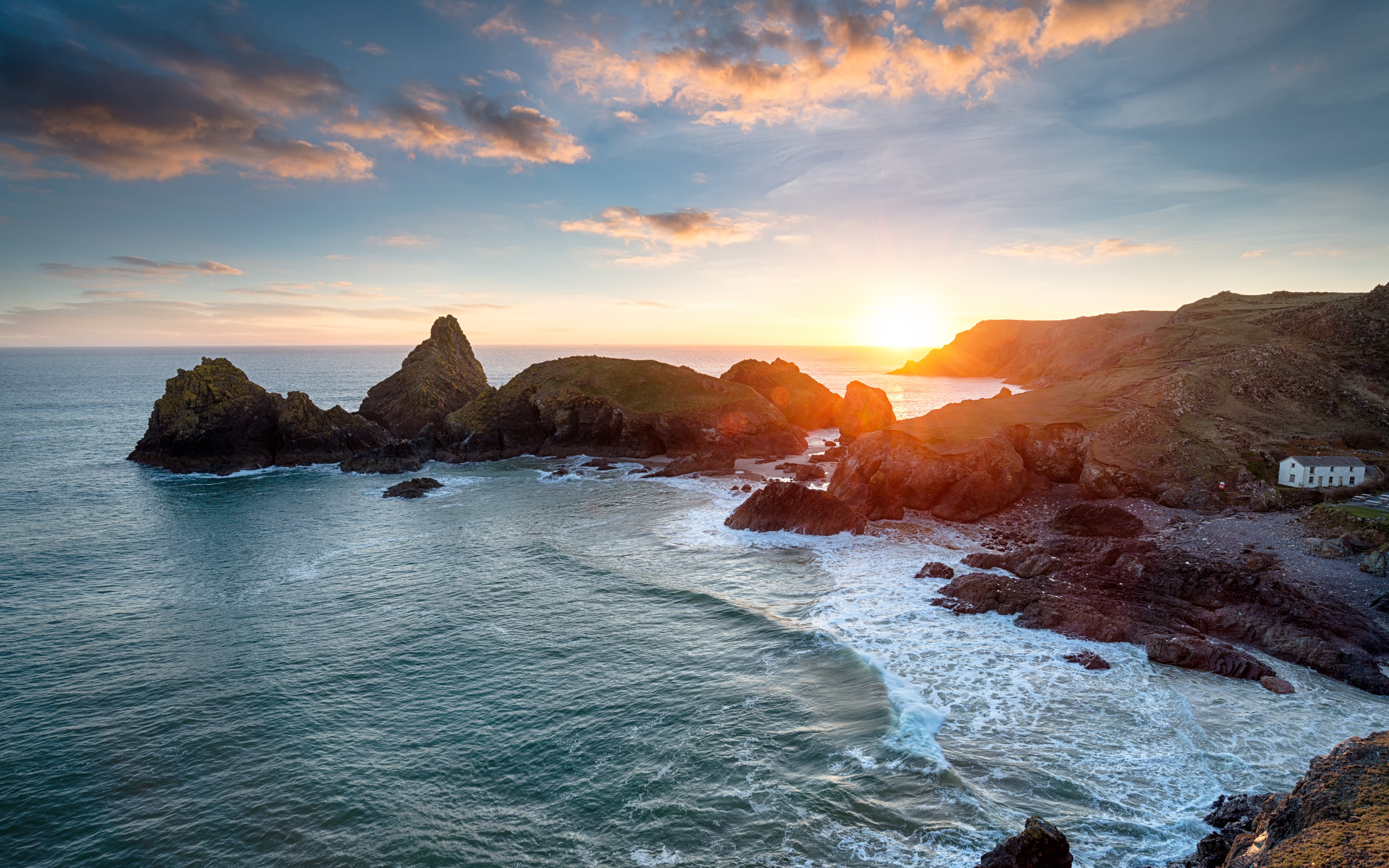 Image of a sunset over Kynance Cove on the Lizard Peninsula in Cornwall.