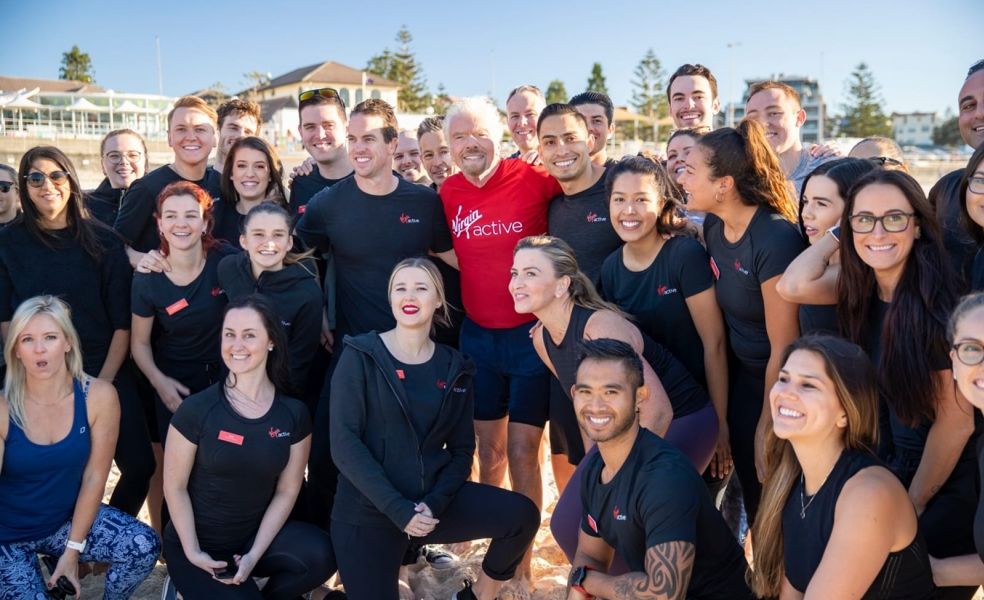 Richard Branson with the team from Virgin Active Australia on Bondi Beach