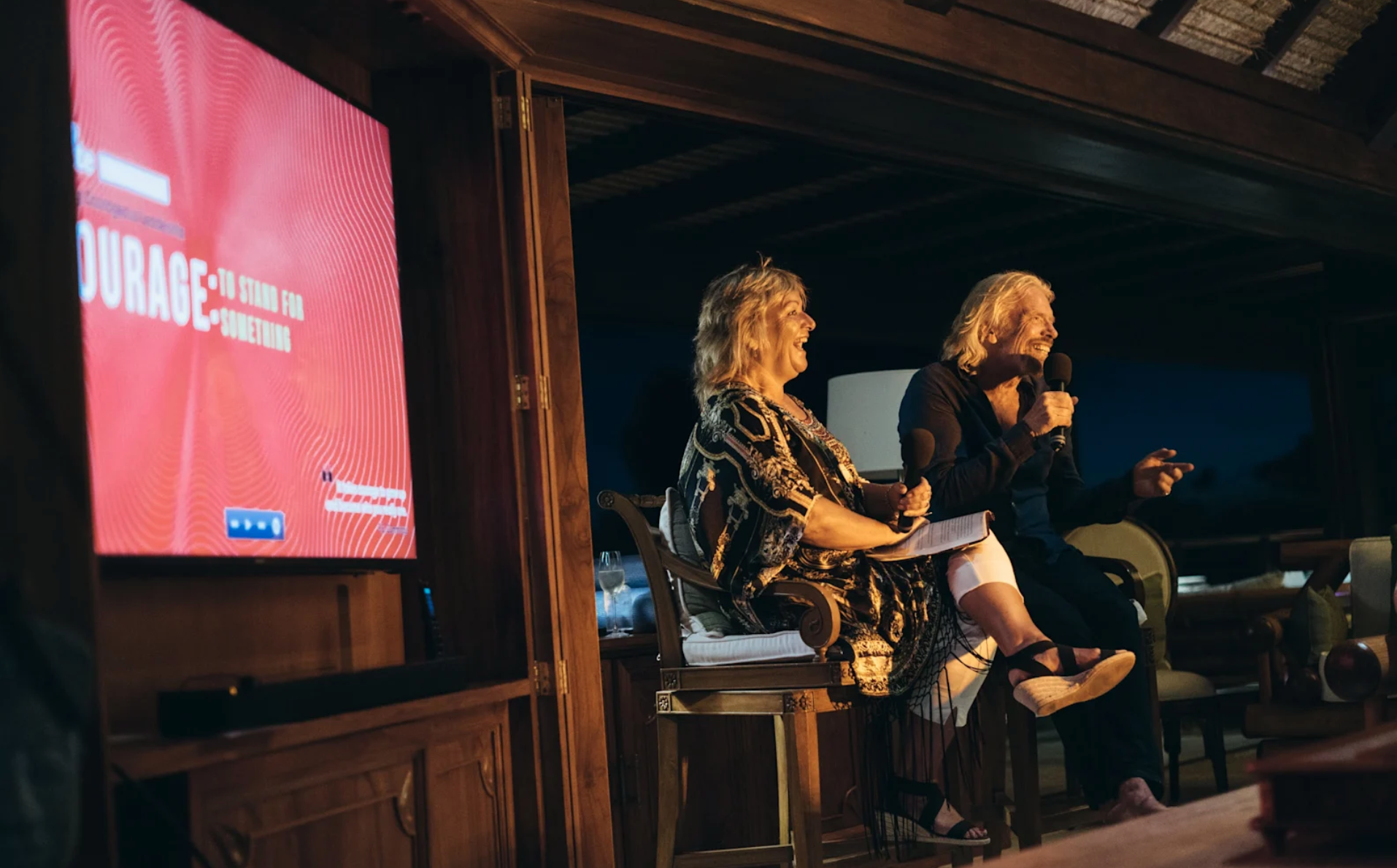 Jane Tewson and Richard Branson presenting at a Virgin Unite Gathering on Necker Island