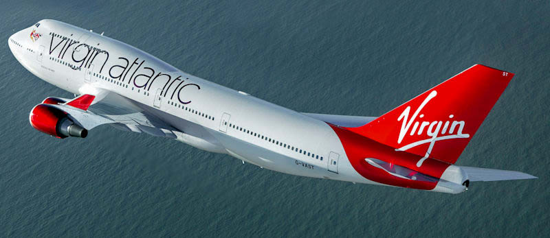 Virgin Atlantic plane in flight, over an ocean
