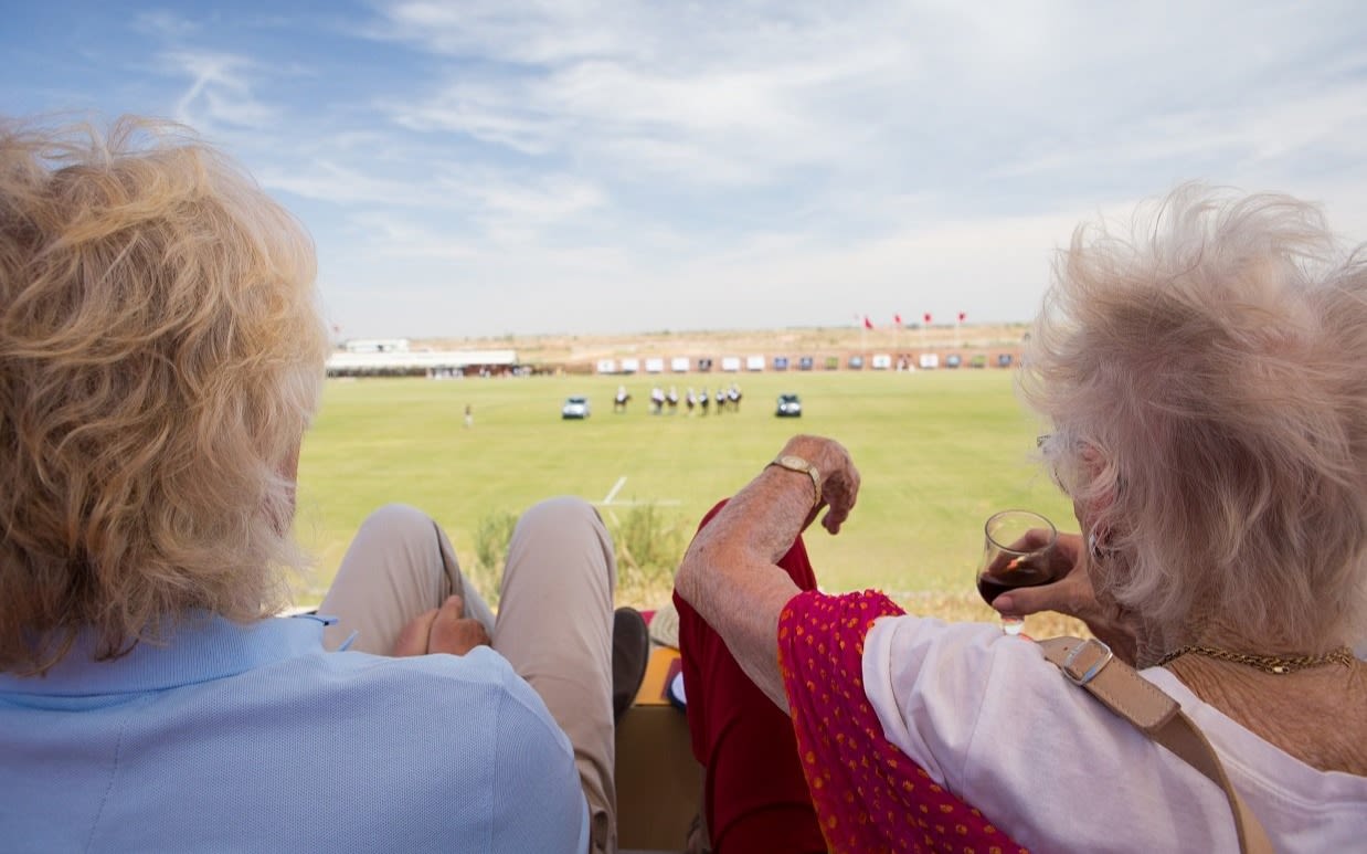 Richard Branson and Eve Branson watching the Polo in Morocco