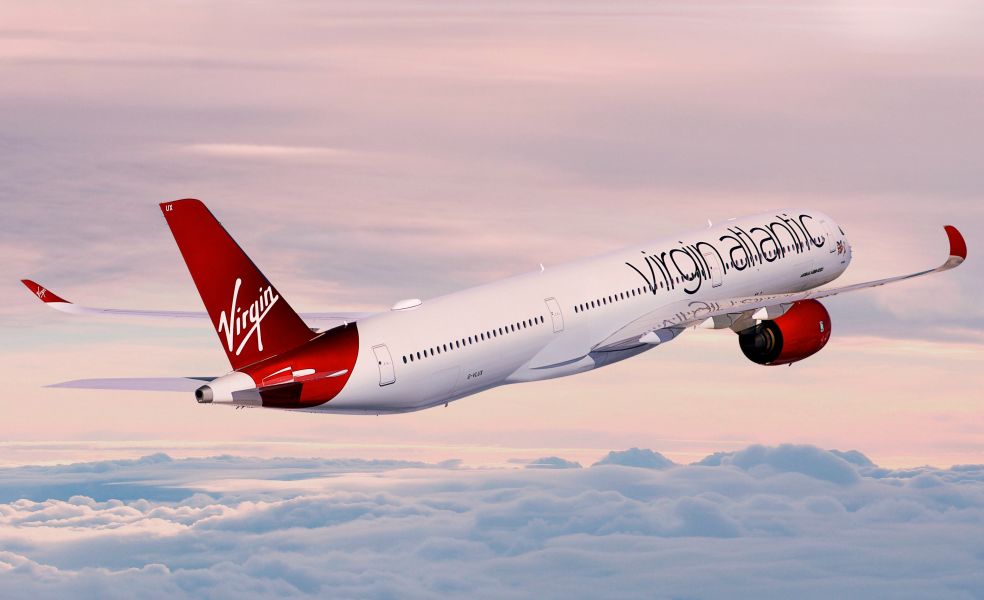 Image of a Virgin Atlantic A350 Aircraft flying into the clouds.