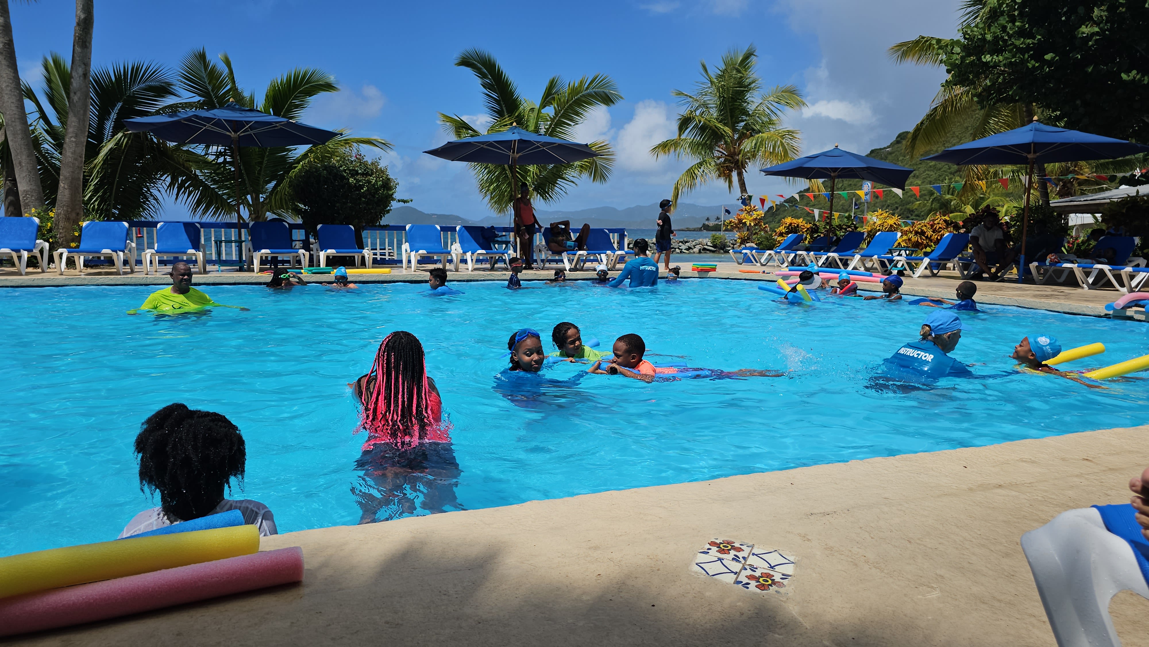 Children learning to swim with Unite for the Sea