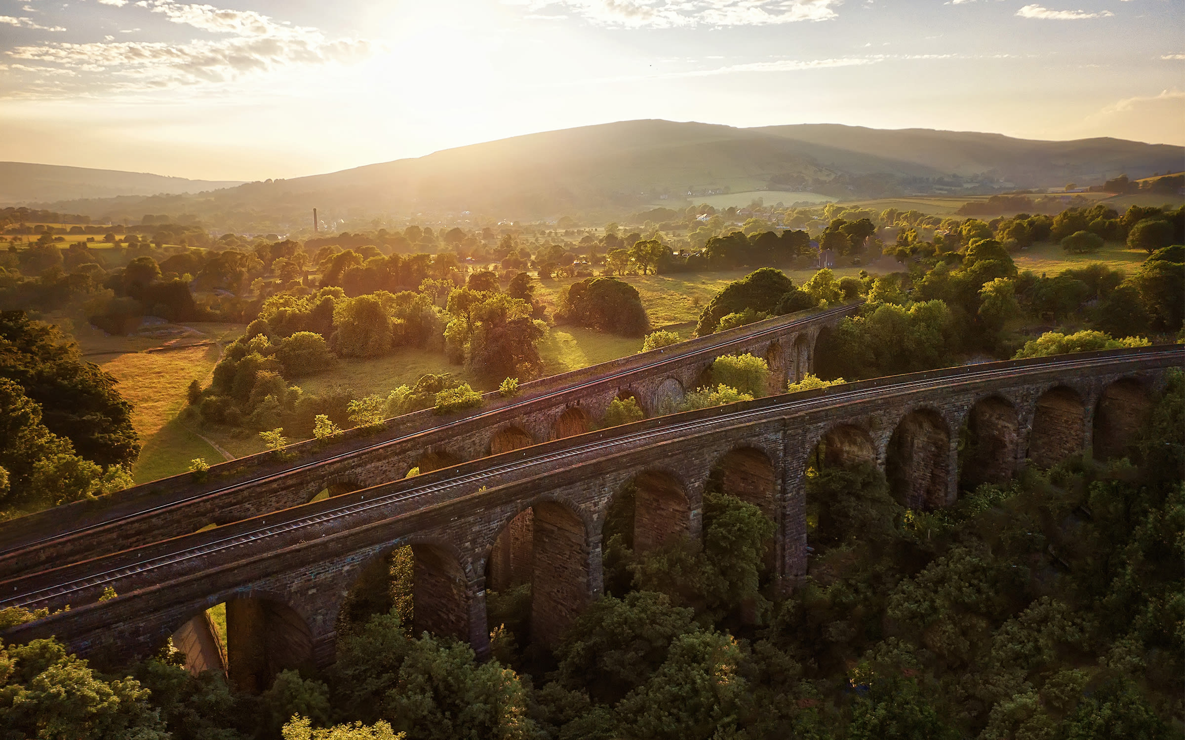 Image of railway tracks in UK landscape