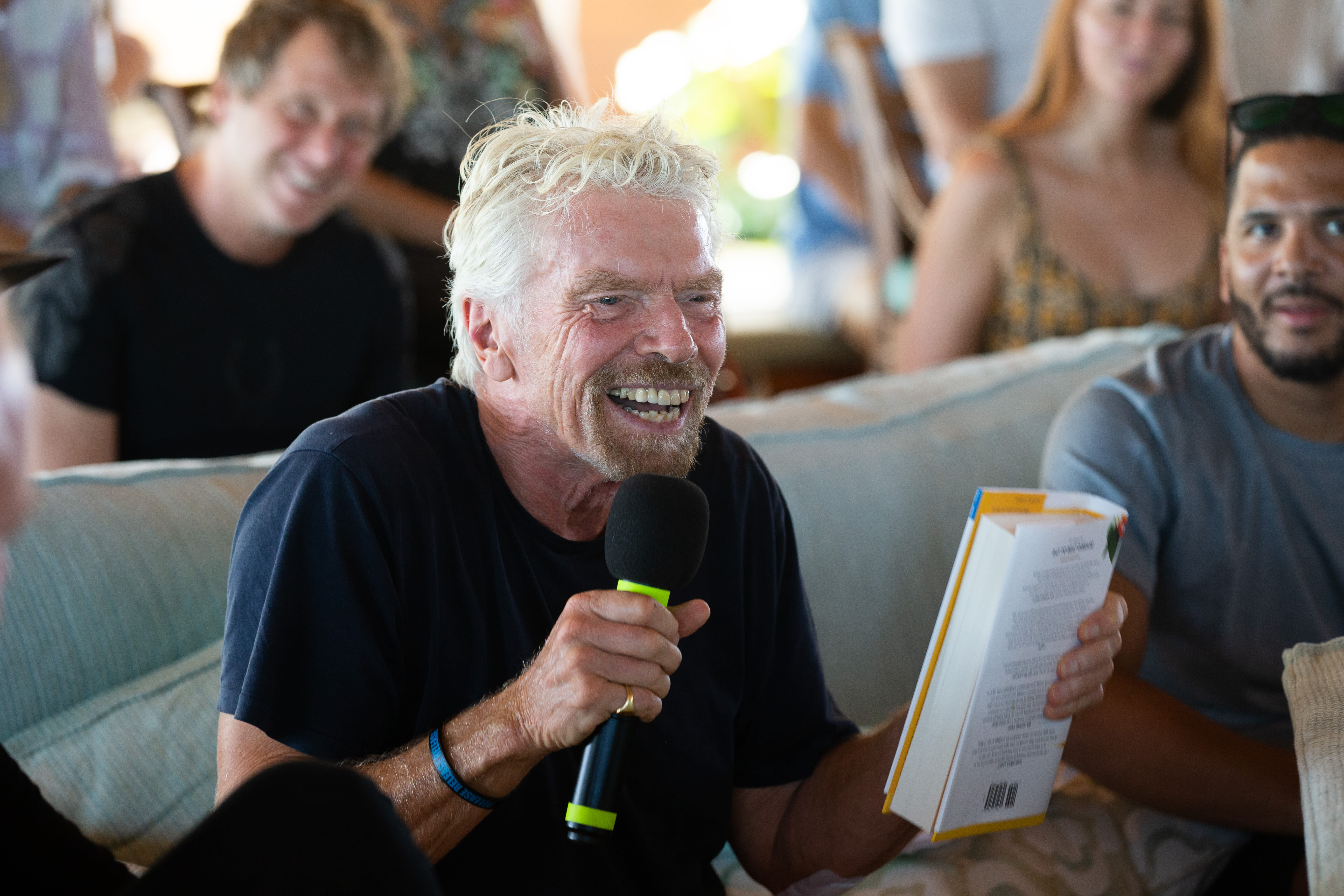 Richard Branson speaking at a Virgin Unite gathering