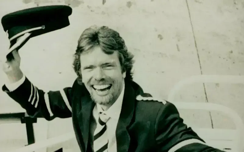 Black and white image of Richard Branson dressed as a pilot