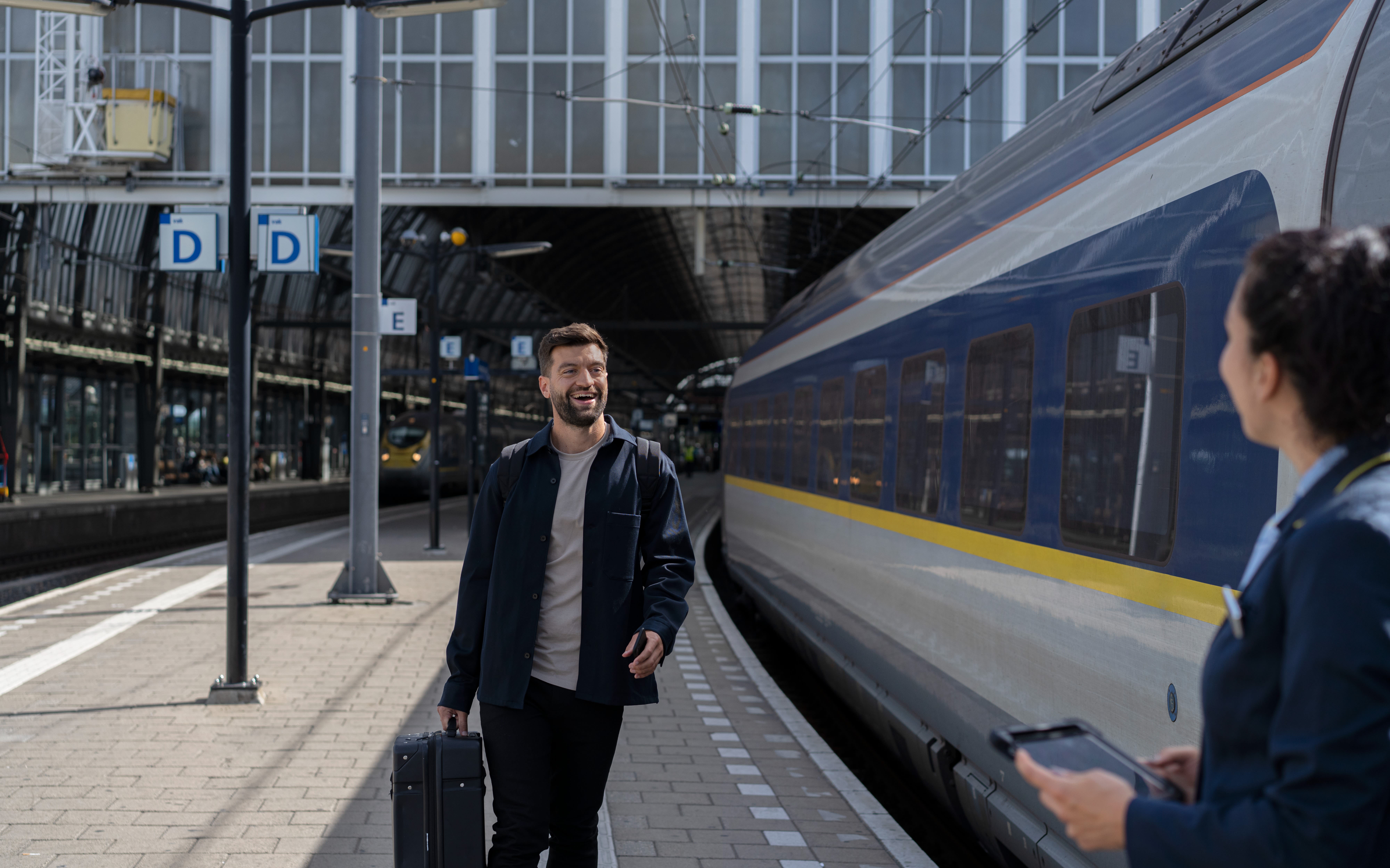An image of a man boarding a Eurostar train in London