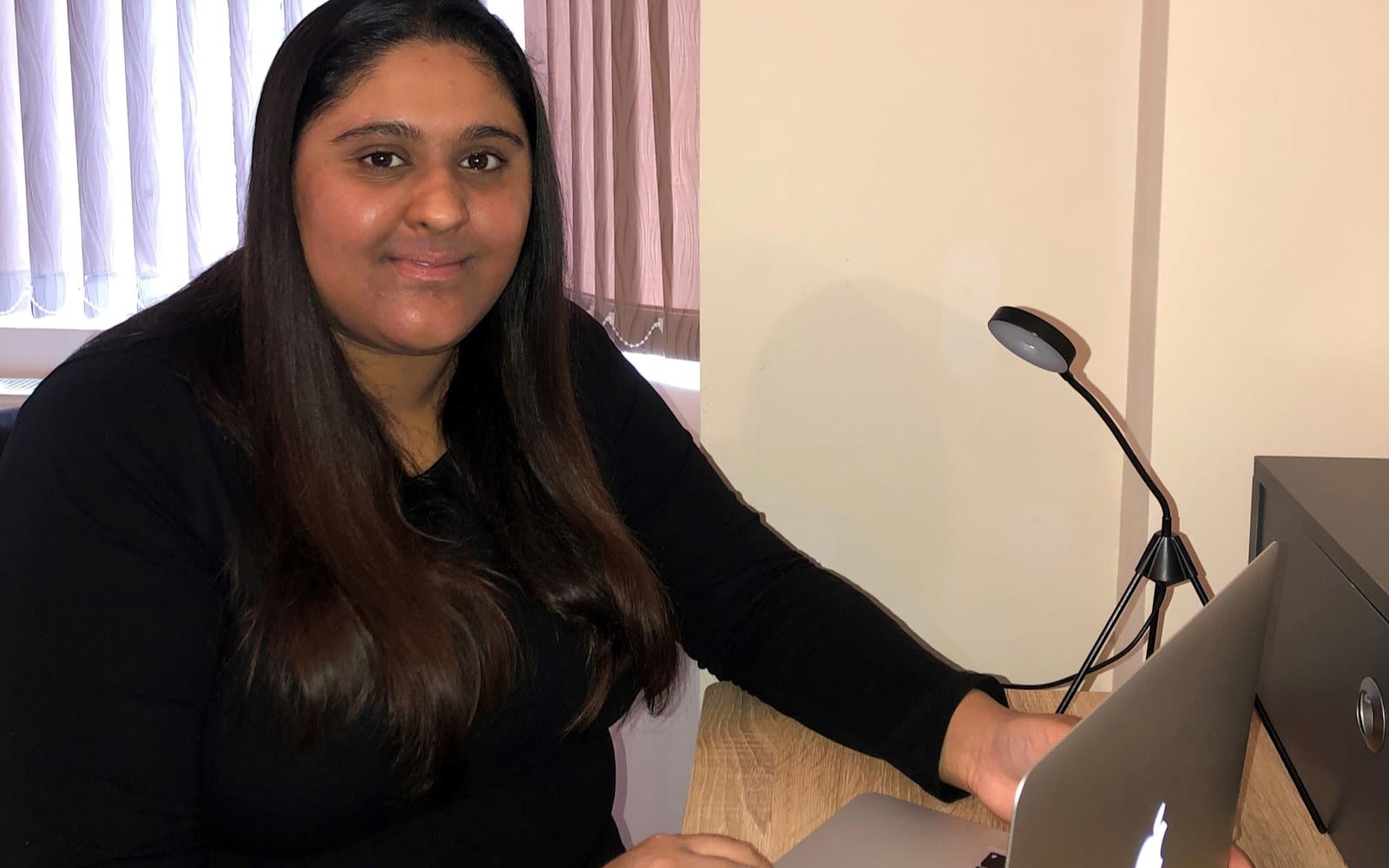 Romi Dhillon, student nurse, completing assessments online