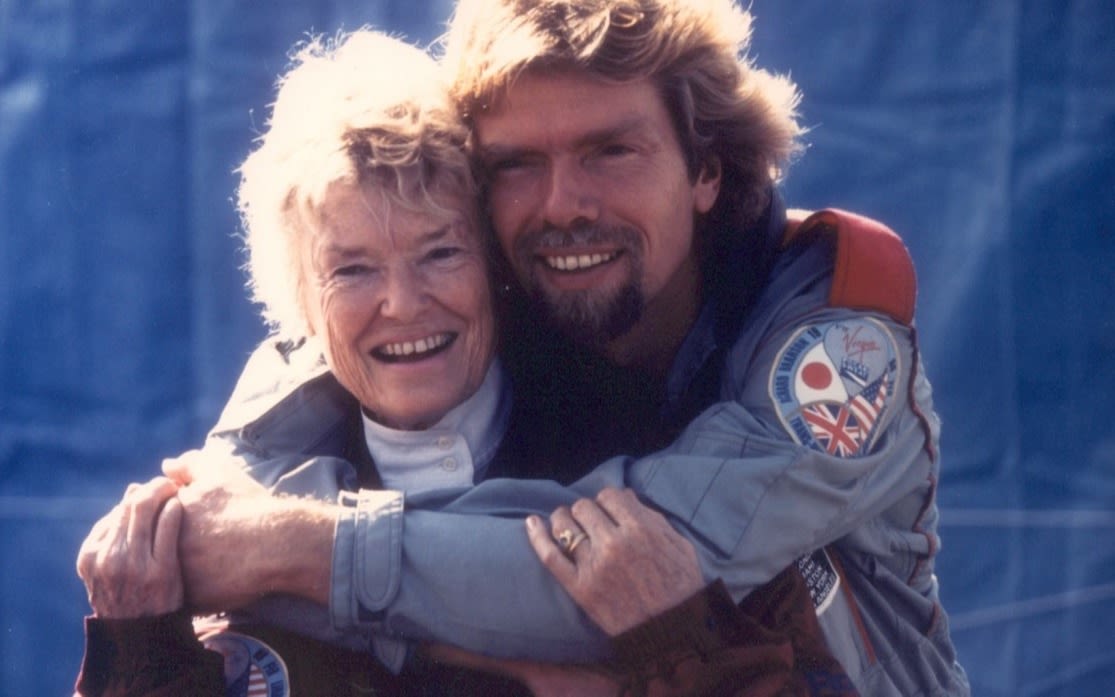 Eve and Richard Branson hugging