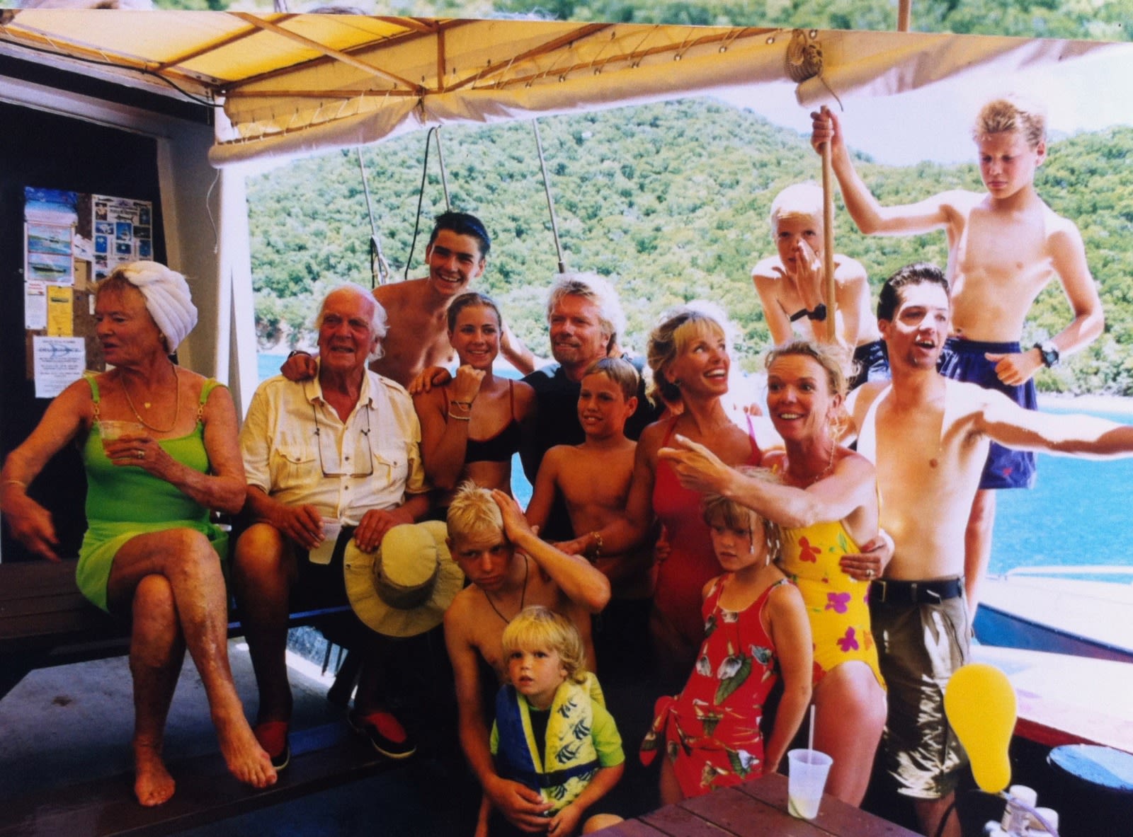 The Branson Family smiling on a boat