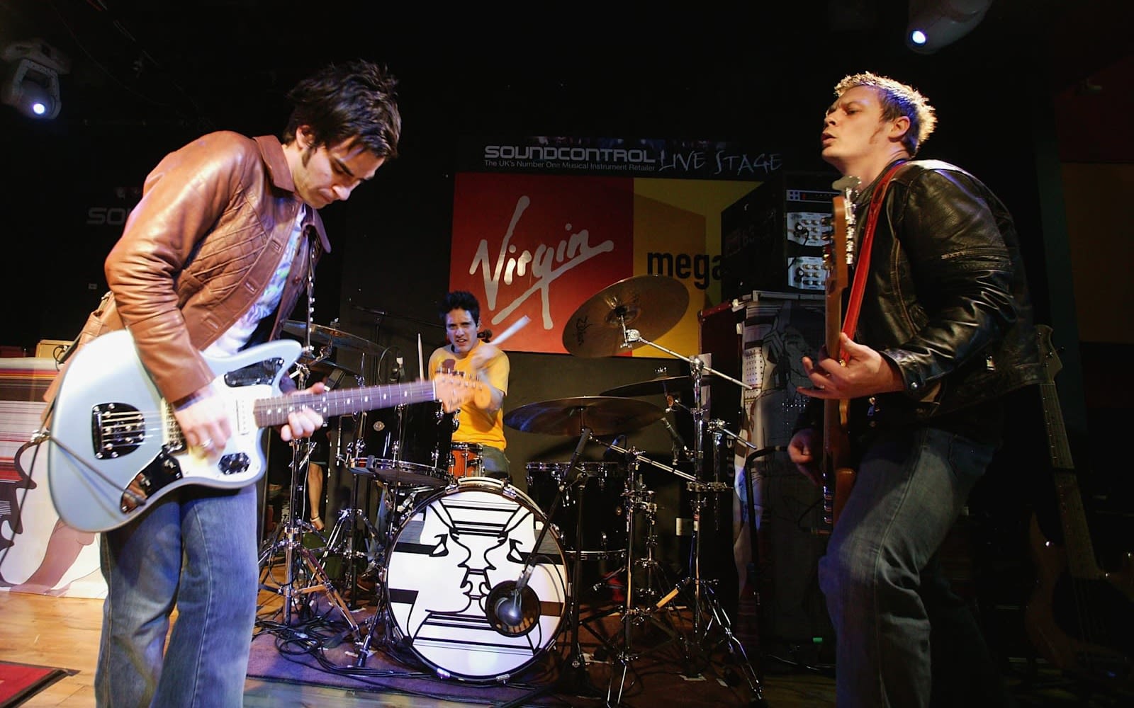 The Stereophonics perform with the Virgin logo in the background