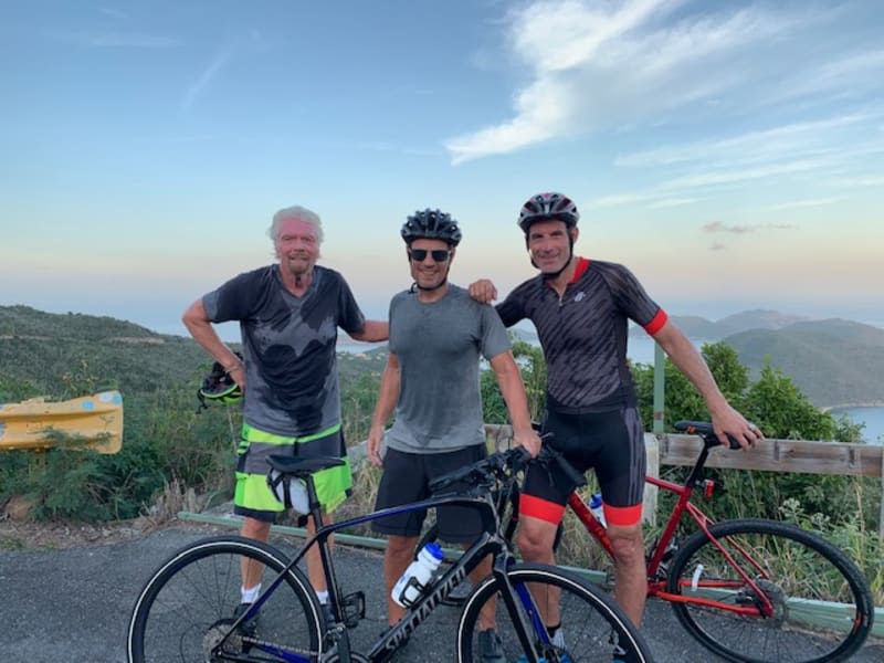 Richard Branson cycling with friends 
