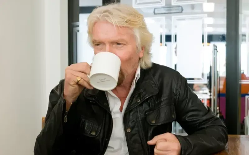 Richard Branson drinking tea at the London office