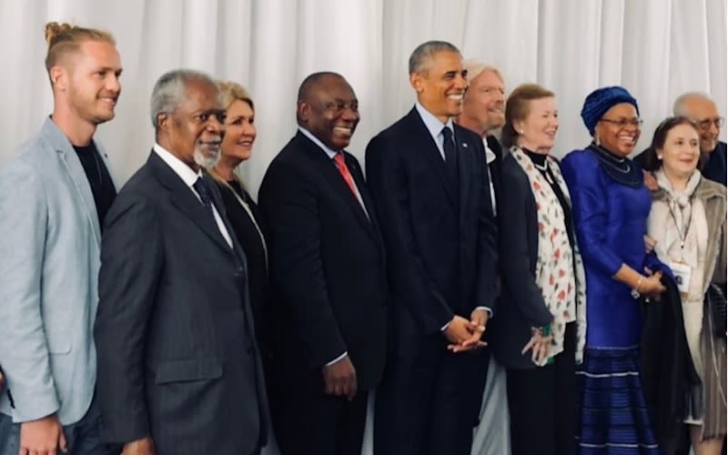 Richard, Joan, and Sam Branson standing with a group including Barack Obama, Kofi Annan and Mary Robinson