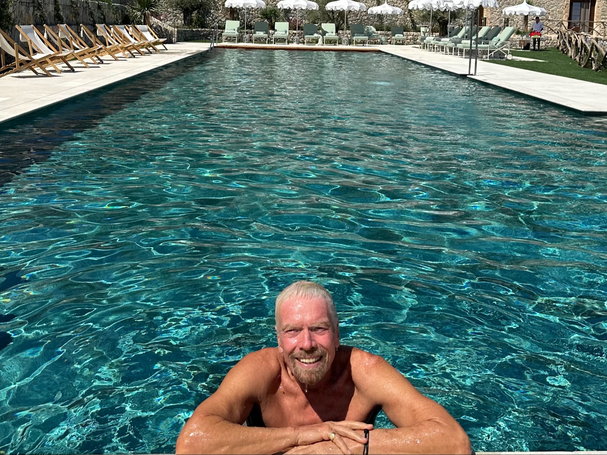 Richard Branson swimming at the Son Bunyola hotel in Mallorca