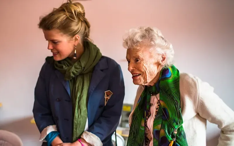 Even Branson and Florence Devereux smiling at an Eve Branson Foundation crafthouse