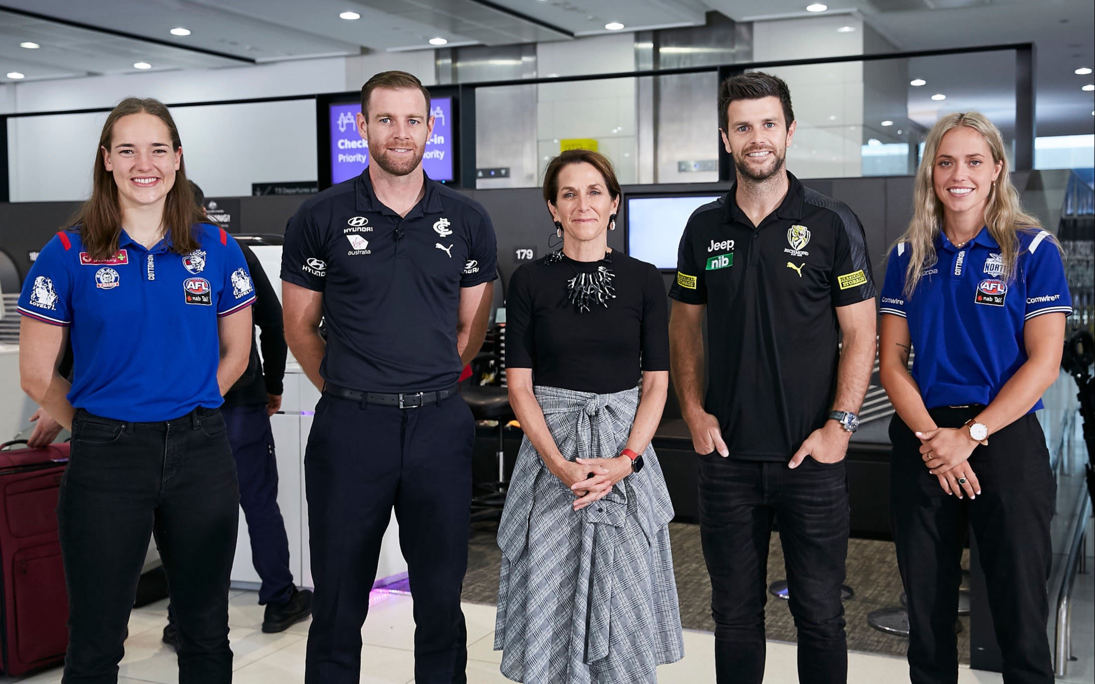 Virgin Australia CEO with AFL and AFLW players