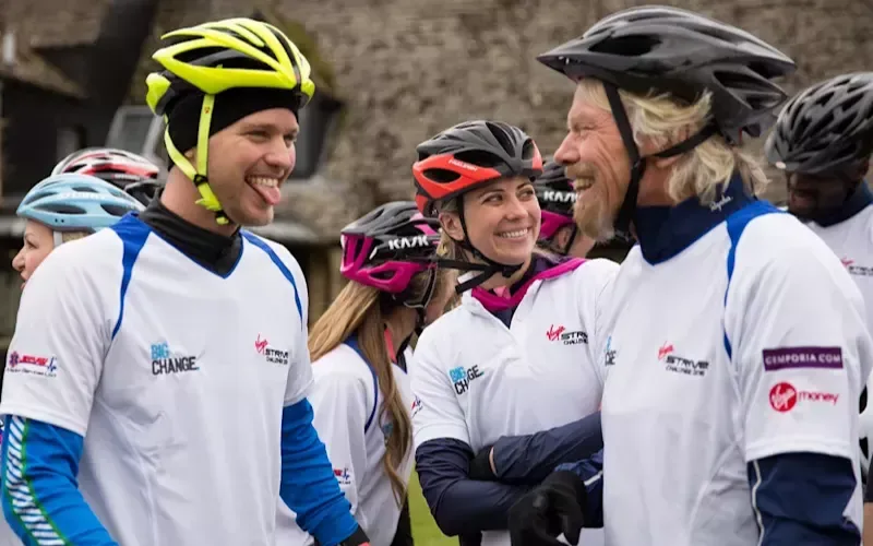 Sam Branson, Holly Branson and Richard Branson wearing cycling helmets during training for The Virgin Strive Challenge