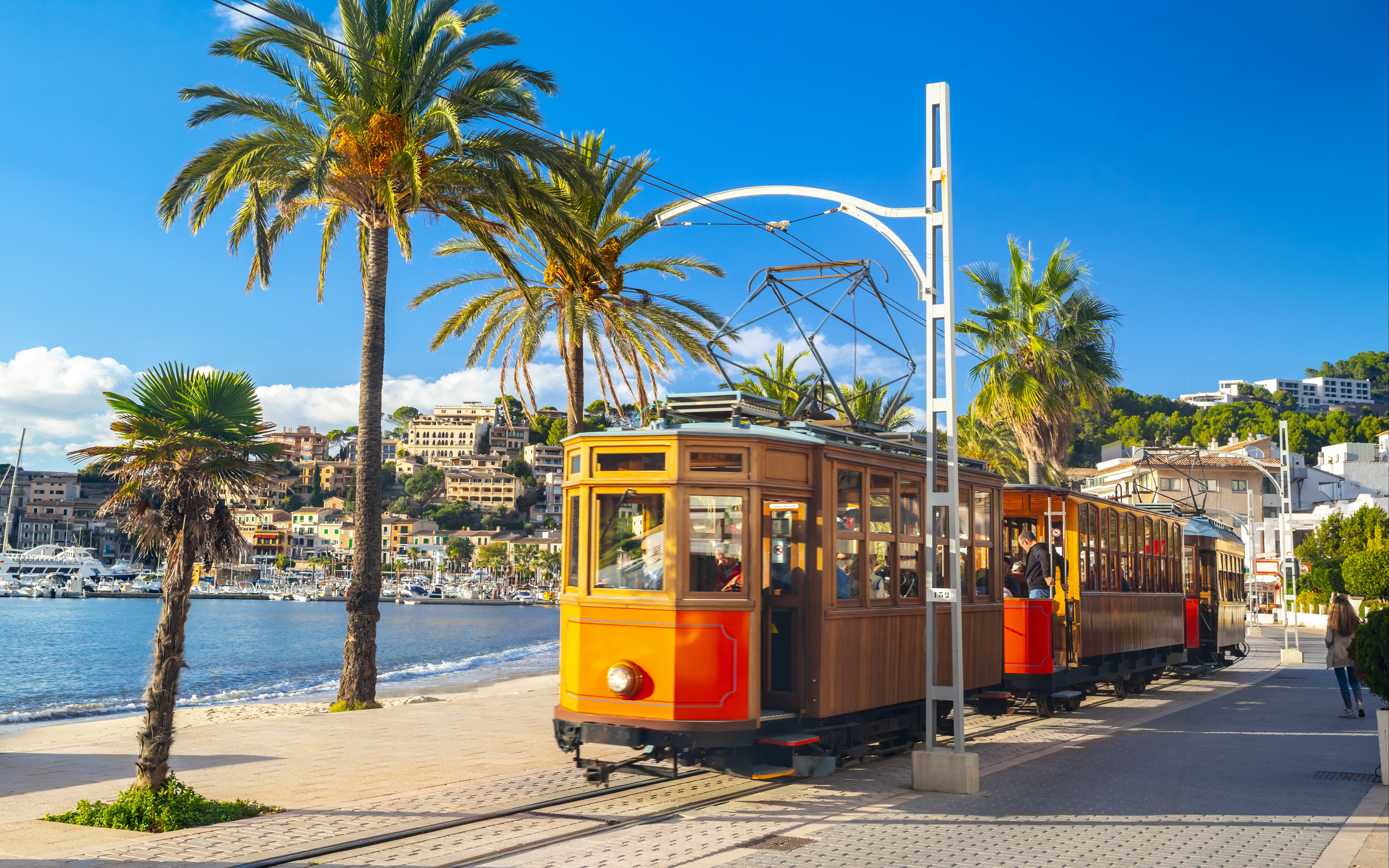 An image of the vintage orange tram in Mallorca