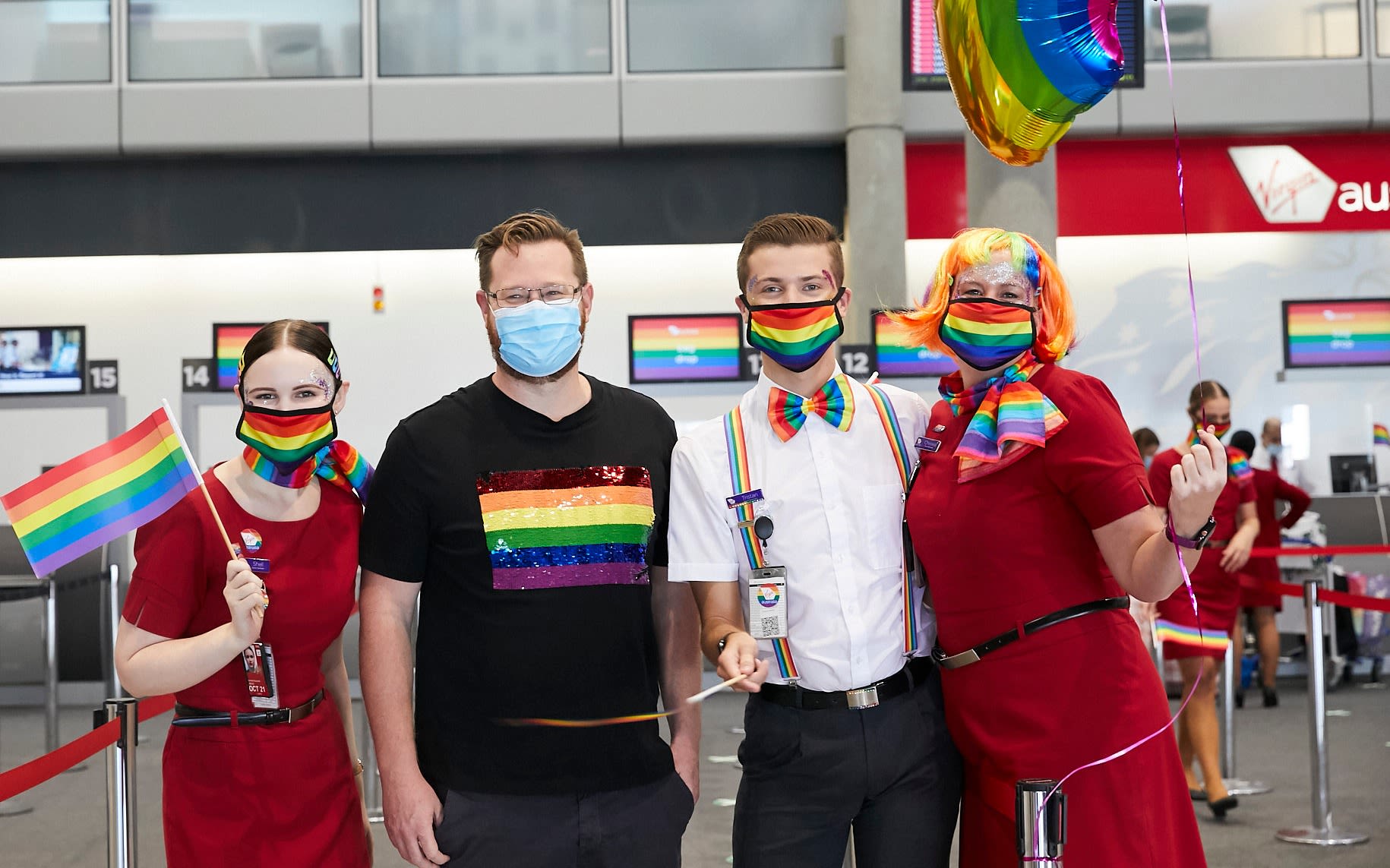 Virgin Australia passengers and crew prepare for the Pride Flight