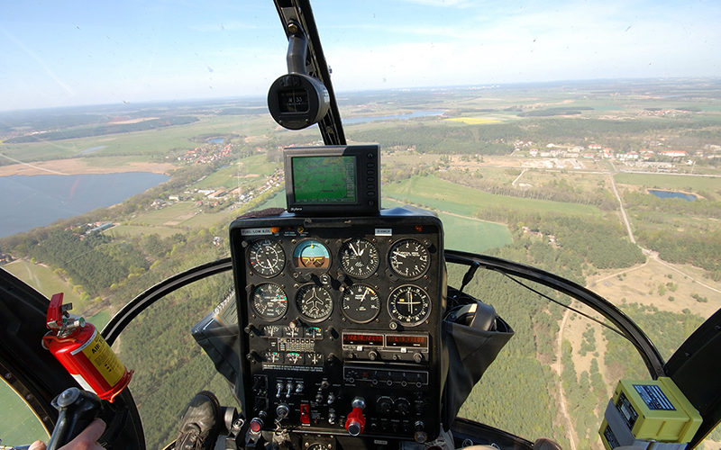 Image of the controls in a helicopter flying over the UK