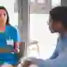Male patient talking to nurse