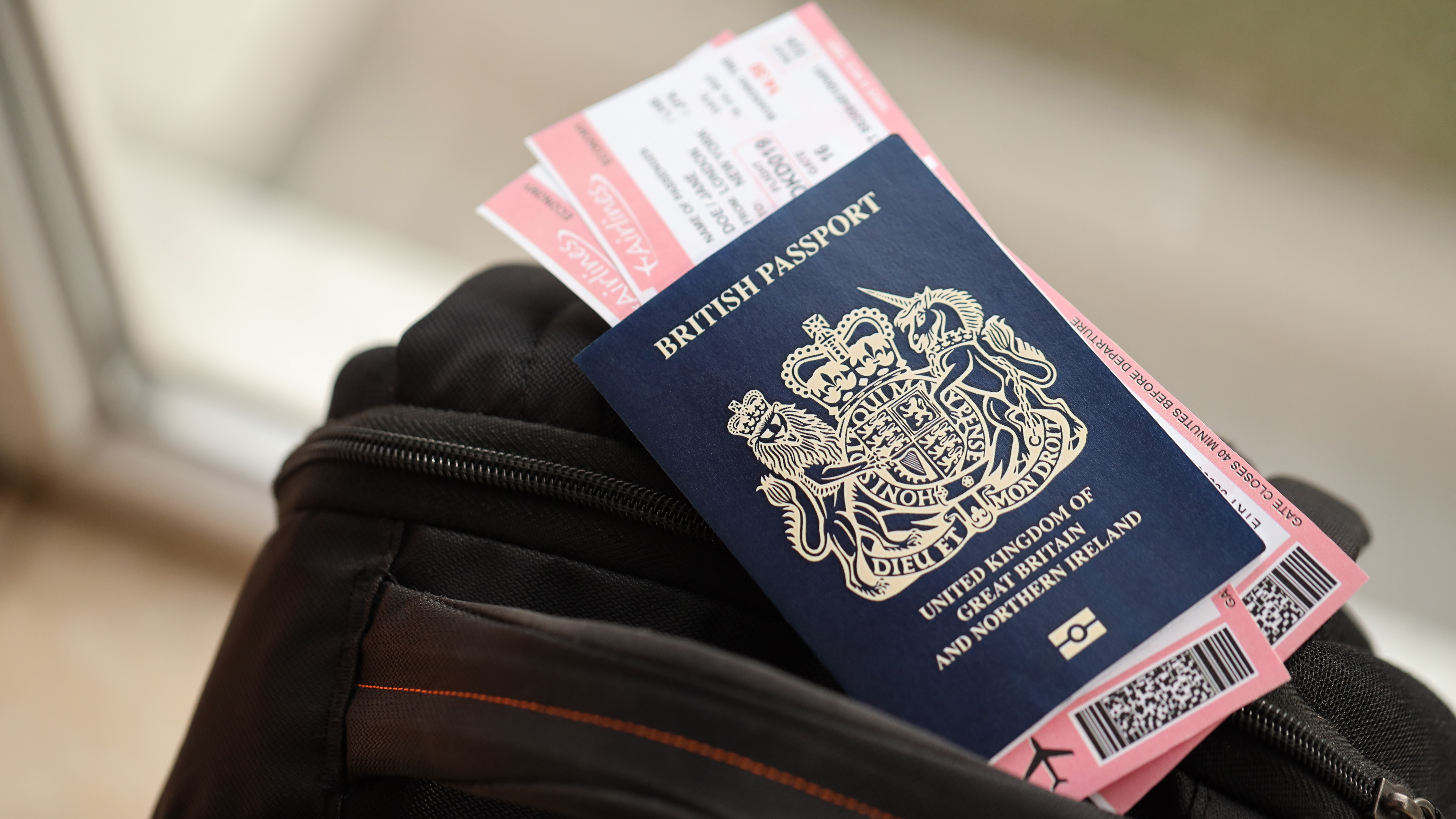 British passport and airplane tickets