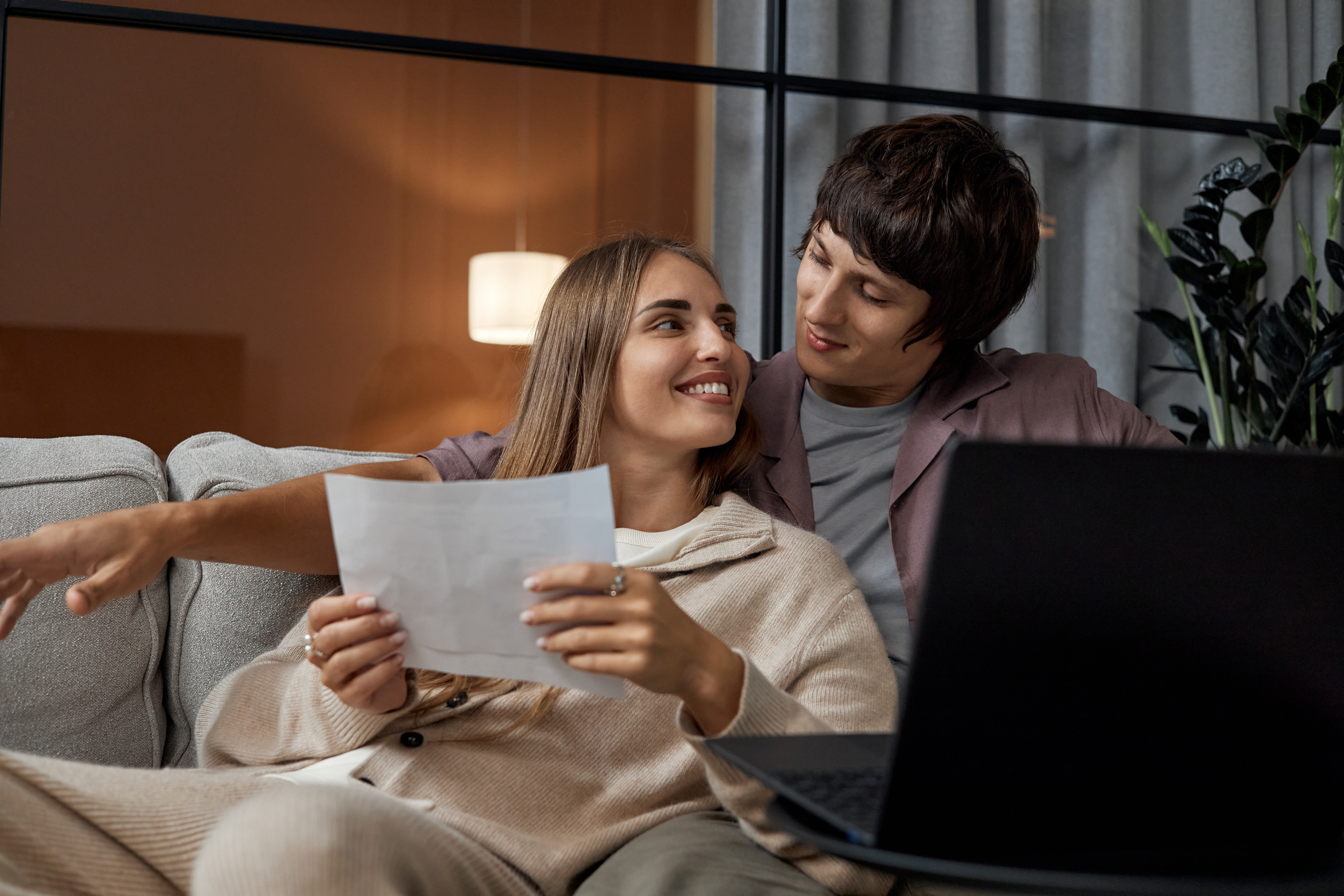 A couple considering their loan options