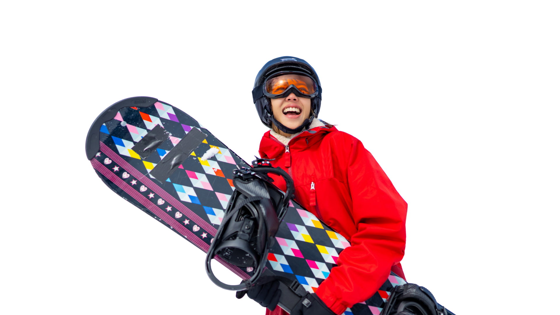 A person in a red snowsuit holding a snowboard 