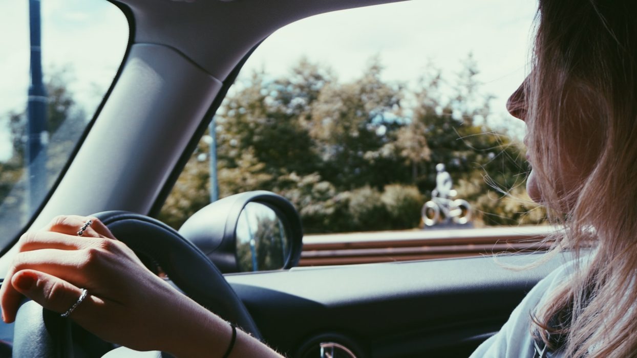 Person driving a car