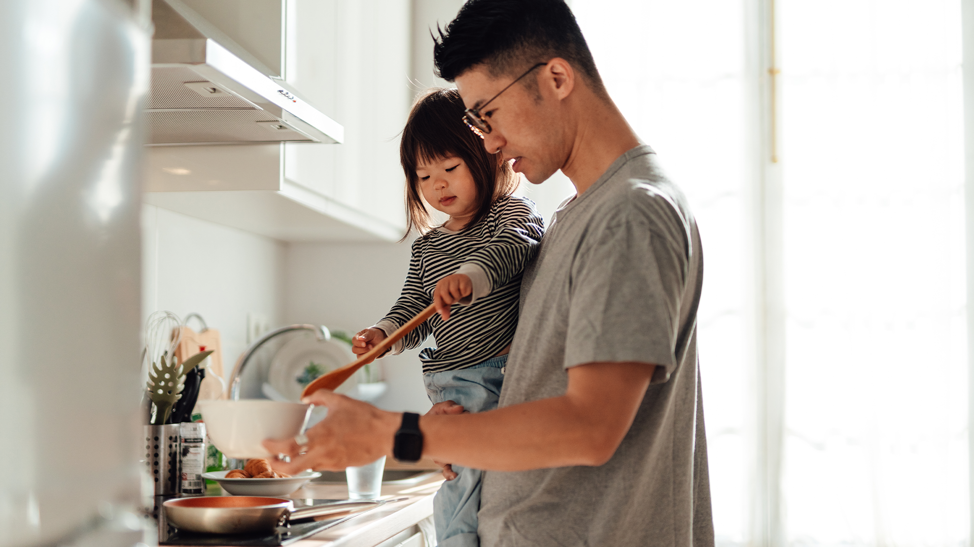Father and daughter cooking