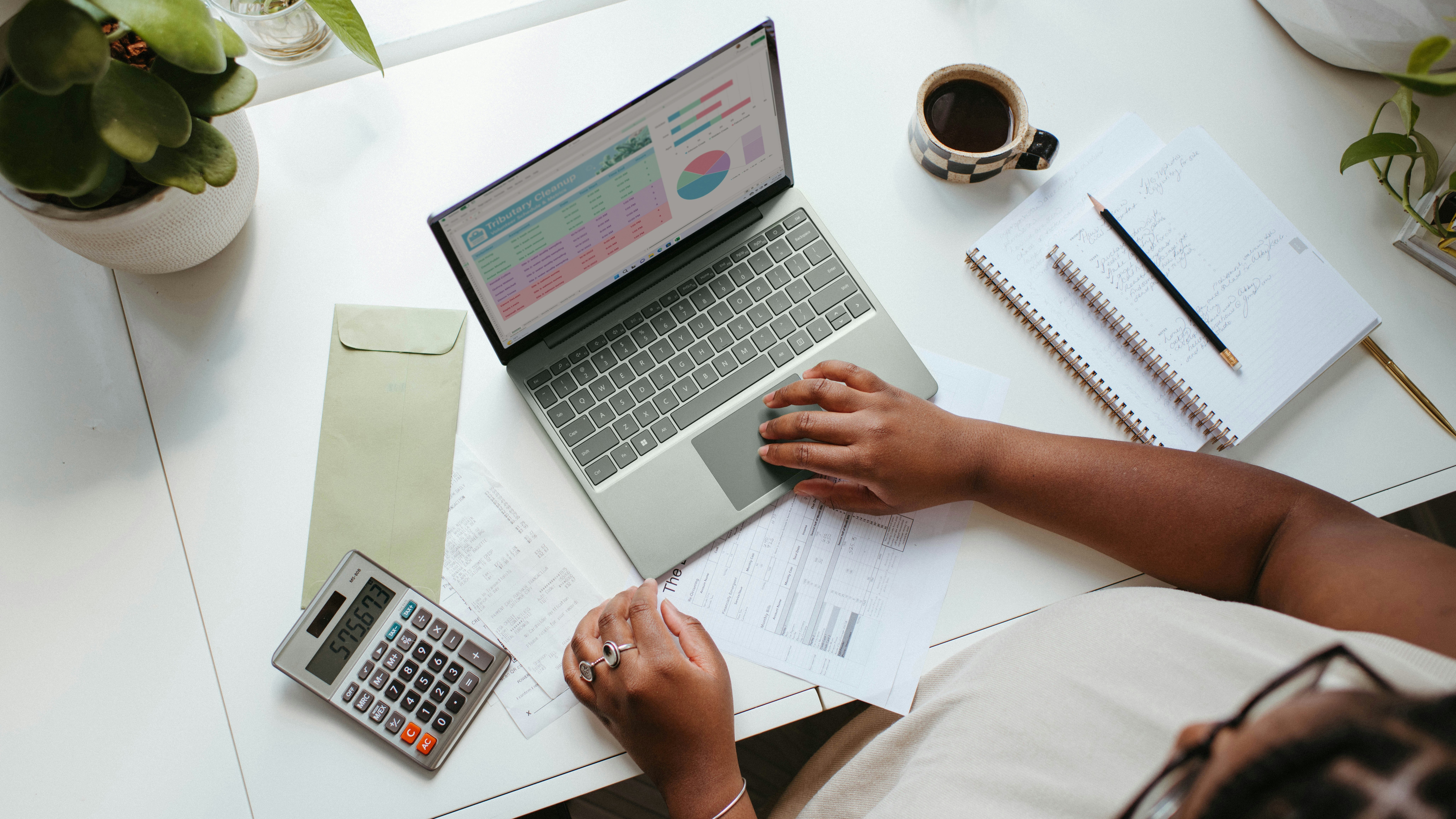 Person typing on a laptop