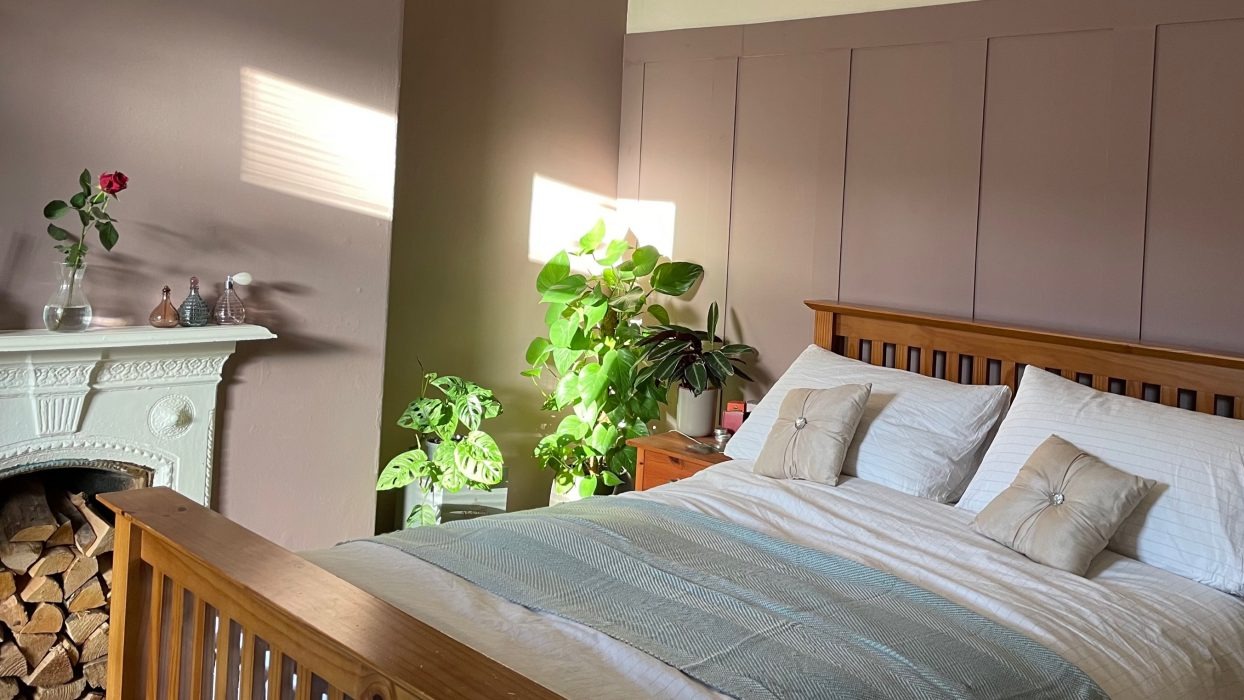 Bedroom with wood panelling
