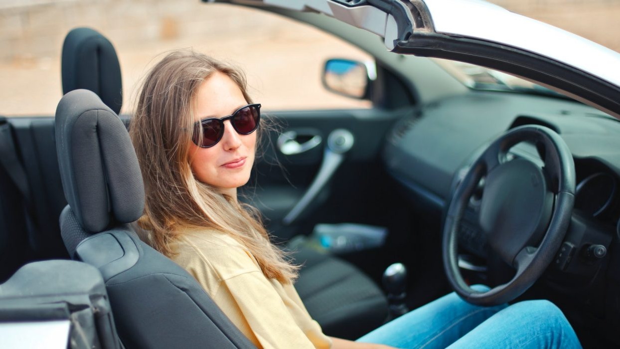 Person sat in convertible car