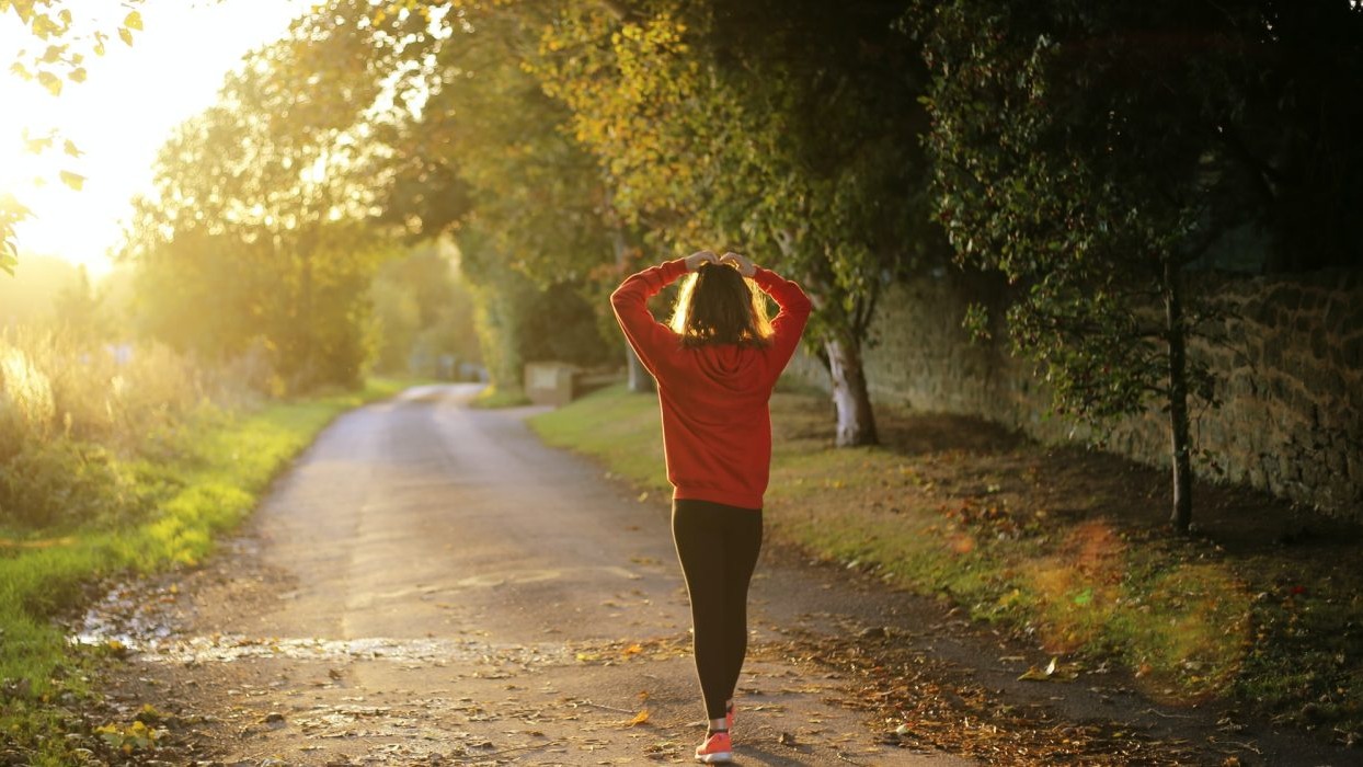 Person walking down a road