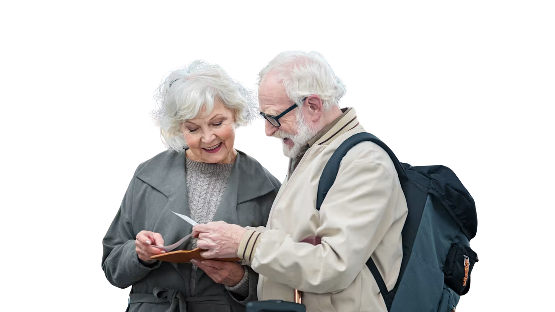 An couple in their over 70s looking at their boarding passes