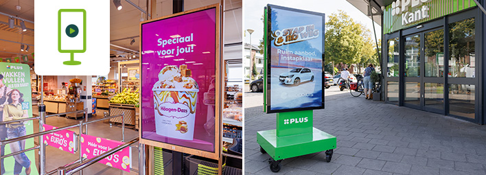 Digitale advertenties bij PLUS supermarkt: binnen een scherm met Häagen-Dazs-ijs, buiten een mobiel display met autoadvertentie.