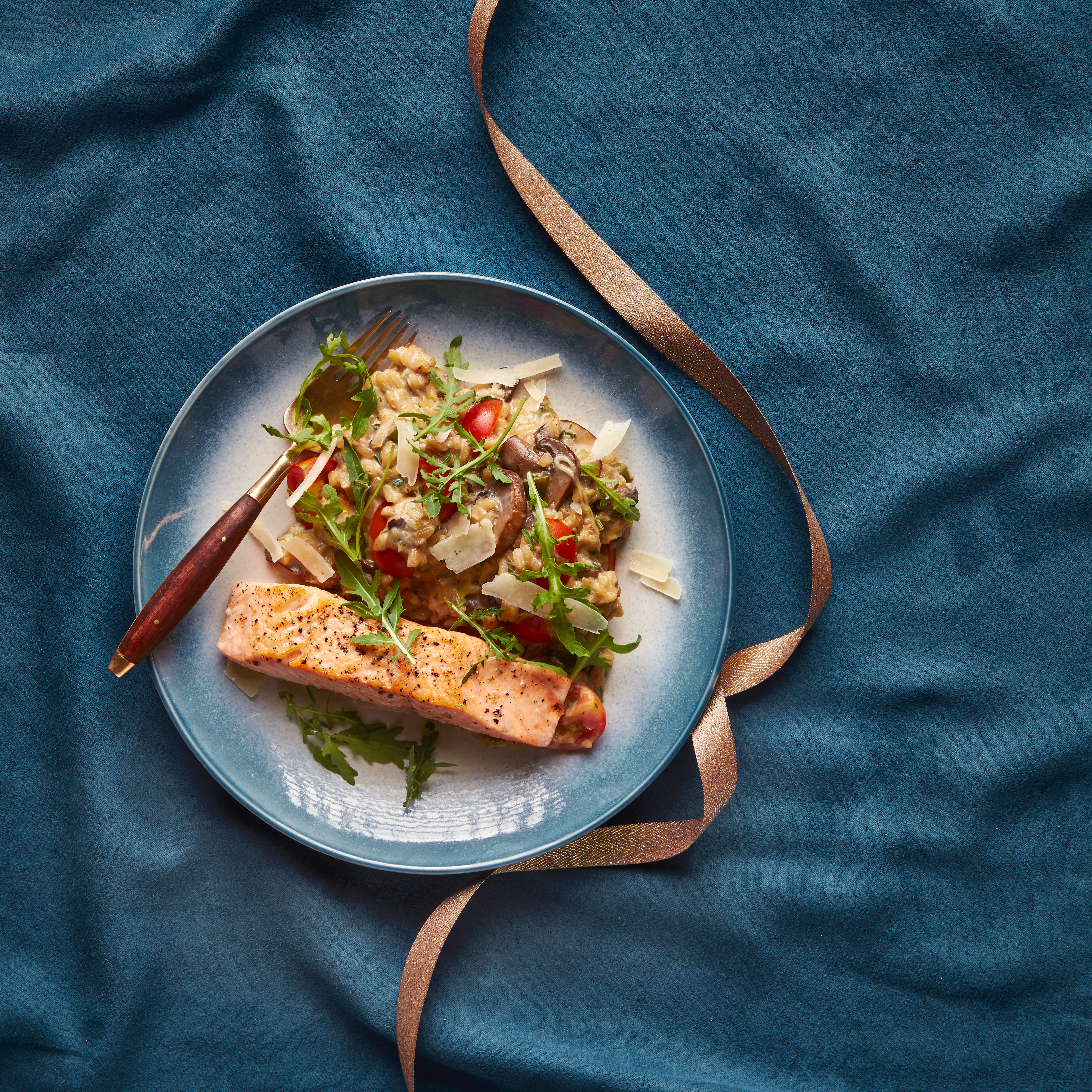Zalmfilet met romige risotto en rucola