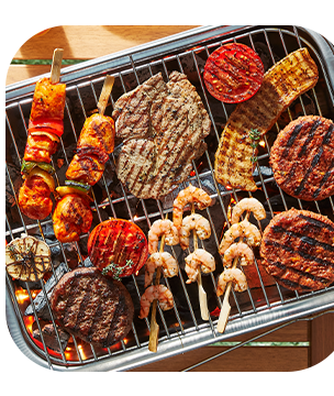 Groenten en vlees uit het BBQ assortiment van PLUS